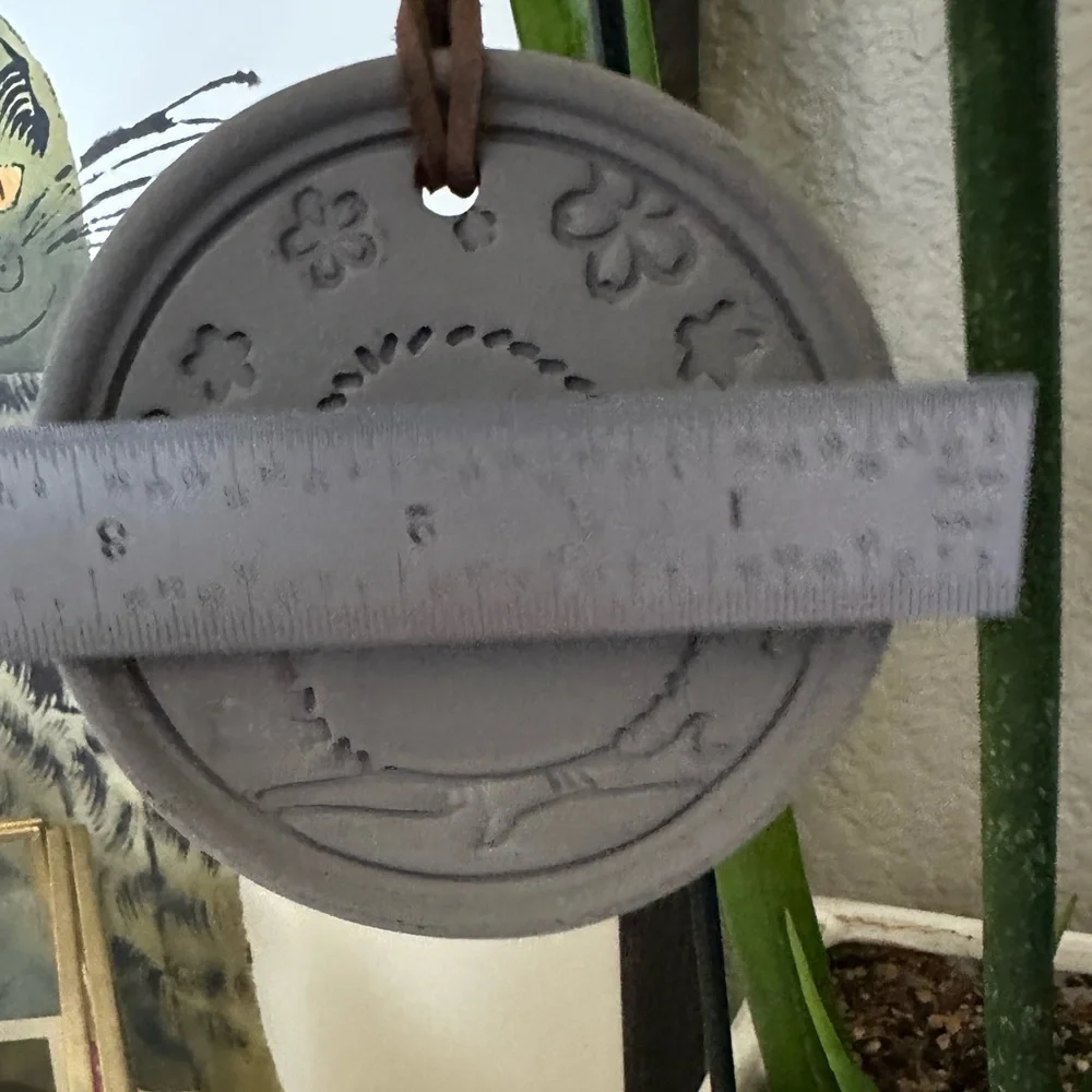Round Ceramic Bird Wall Hanging in Matte Gray